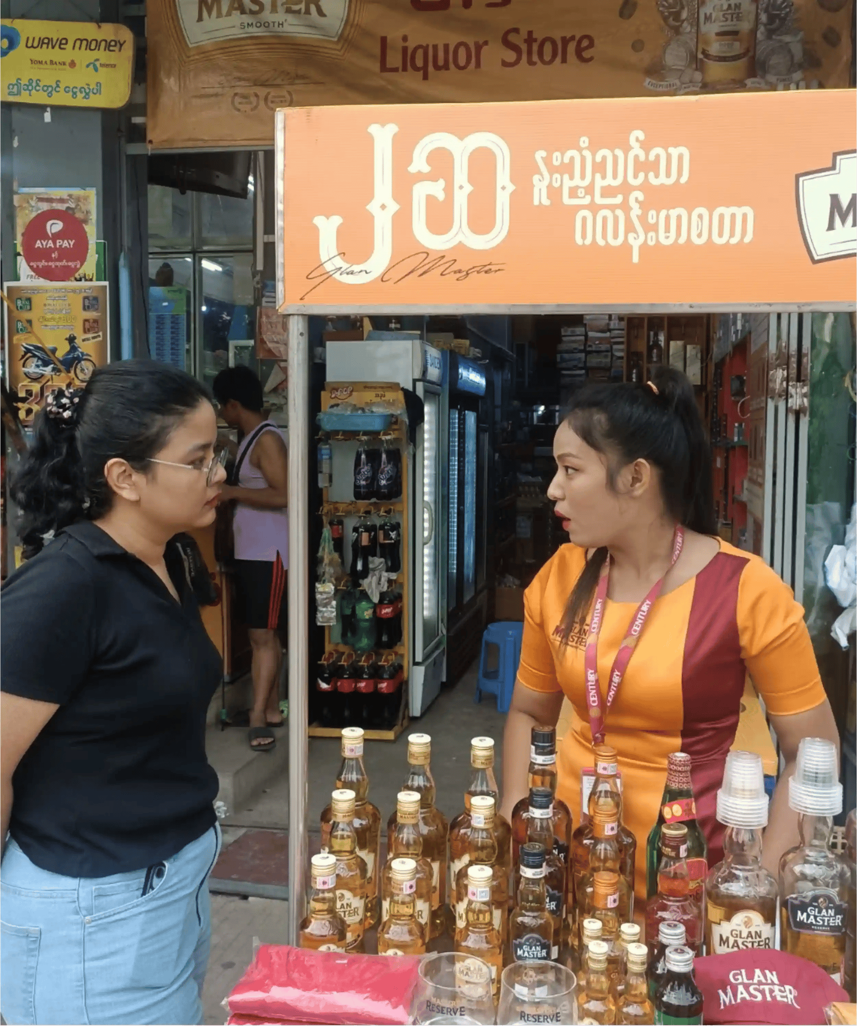 Myat talking to Glan Master Brand Promoter Myat talking to Glan Master Brand Promoter